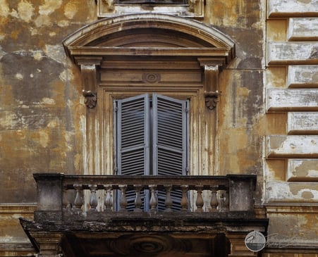 Ancient-Brown-Toned-Building-with-Window-with-Balcony-in-Rome-Italy